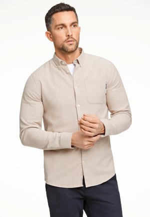 Beige overhemd met lange mouwen en knopen, voorzien van een borstzak, gemaakt van gestructureerde stof, met een nette kraag en een afgeronde zoom.