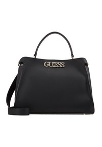 Sac à main en cuir noir avec une finition texturée, une poignée supérieure et une bandoulière amovible. Caractérisé par un logo "GUESS" argenté sur le devant.