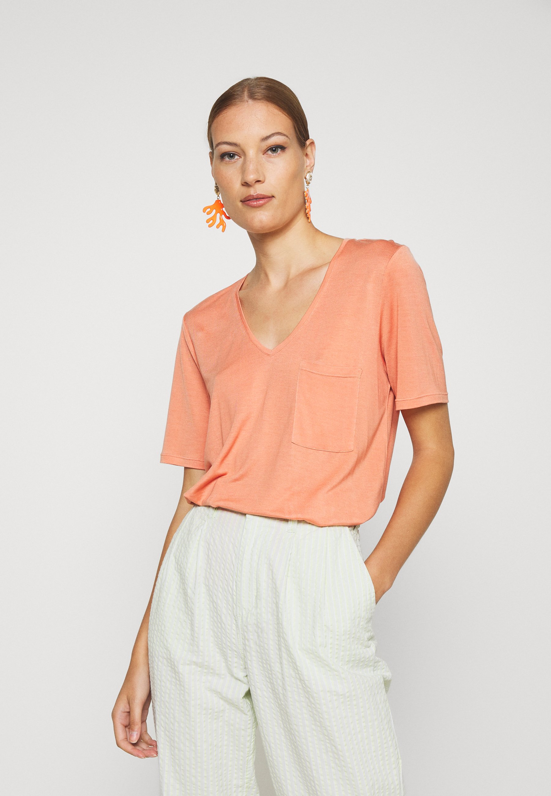 Oransje T skjorter & topper | Dame | Nye overdeler på Zalando Oransje T skjorter & topper | Dame | Nye overdeler på Zalando