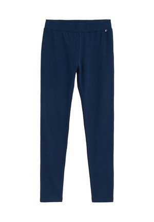 Leggings bleu marine ajustés avec une ceinture élastique sans couture et un petit logo de la marque près de la taille sur fond blanc.