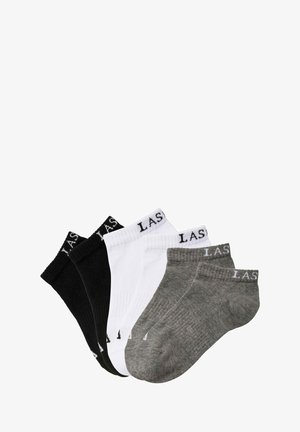 Set aus drei Knöchelsocken in Schwarz, Weiß und Grau. Gerippte Textur mit "LAS"-Druck auf den elastischen Bündchen. Material aus Baumwollmix.