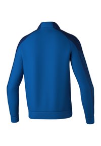 Blaue Sportjacke mit hohem Kragen, langen Ärmeln und strukturierten marineblauen Seitenteilen. Der Stoff erscheint glatt mit gerippten Bündchen und Saum.