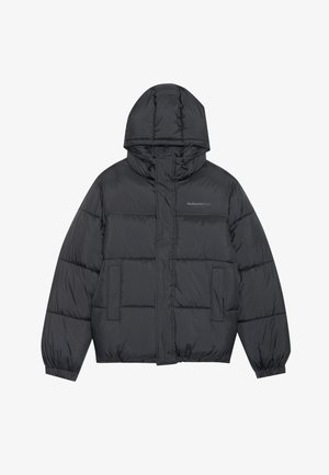 Puffervest i mørkegrå med lynlåslukning, hætte, to forlommer, elastiske manchetter og quiltede puffer, der skaber tekstur. Logo på brystet.