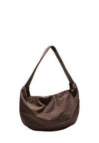 Brun stof skuldertaske med et blødt, afslappet design. Den har en bred, flad rem og en glat overflade uden synligt hardware eller detaljer.