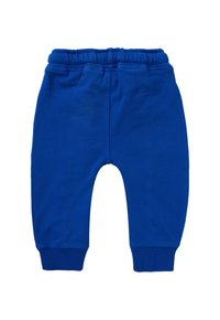 Blauwe sweatpants van katoen. Heeft een elastische tailleband en ribgebreide boorden. Soepele textuur, taps toelopend ontwerp en geen extra patronen.