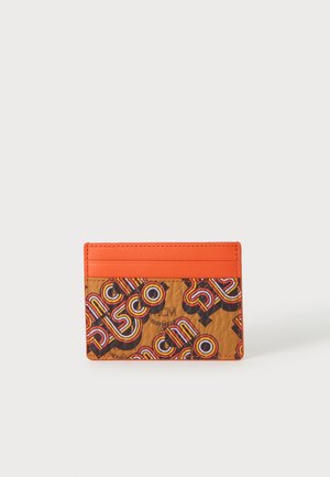 Porte-cartes fin avec haut orange et bas à motif présentant un texte coloré répété ""DISCO"" sur fond marron.
