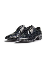 Scarpe nere in pelle verniciata con accenti glitterati multicolori, design a punta e chiusura tradizionale con lacci. Tacco piatto, texture liscia.