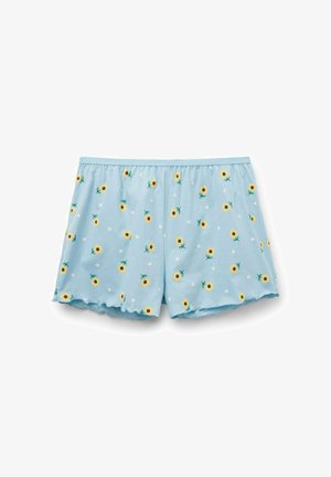 Short bleu clair avec taille élastique, motifs dispersés de tournesols jaunes et petits cœurs blancs, et ourlets légèrement froissés.
