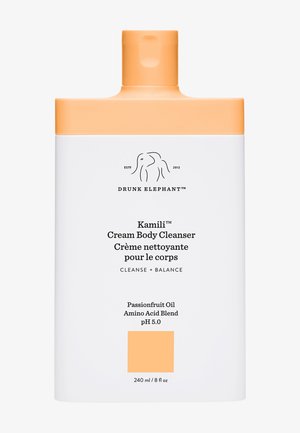 Drunk Elephant Kamili Cream Body Cleanser, 240 ml, features a white bottle with an orange top, labeled with product details and a minimalist elephant logo.