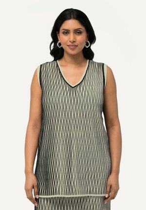 Tunique senza maniche in crema e nero con scollatura a V. Presenta righe verticali testurizzate e una vestibilità allungata e rilassata.