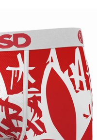 Los bóxers para hombre en rojo y blanco cuentan con un tejido texturizado, una cintura gris con logo y un estampado de estilo grafiti en toda la tela.