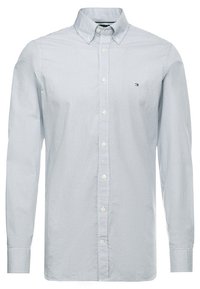 Jasnoniebieska, długosleeve koszula zapinana na guziki, z drobnym wzorem w kratkę i małym prostokątnym logo na lewej piersi.