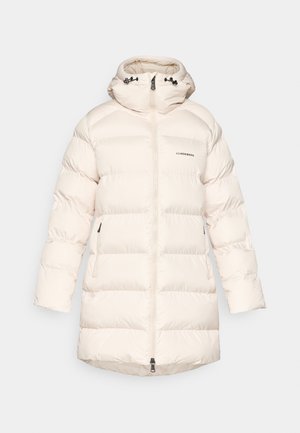 Jachetă puffer de culoare crem, cu guler înalt, fermoar frontal și două buzunare laterale. Fabricată dintr-un material neted, izolat, cu panouri cusute.
