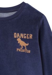 Navy blue sweatshirt made of soft fabric, featuring an orange graphic design with text "DANGER" and "PREDATOR" alongside a dinosaur illustration.