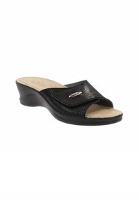 Sandales noires à talon compensé avec un design ouvert, dessus texturé et sangle ajustable. Semelle intérieure couleur crème et talon incurvé pour un meilleur soutien.