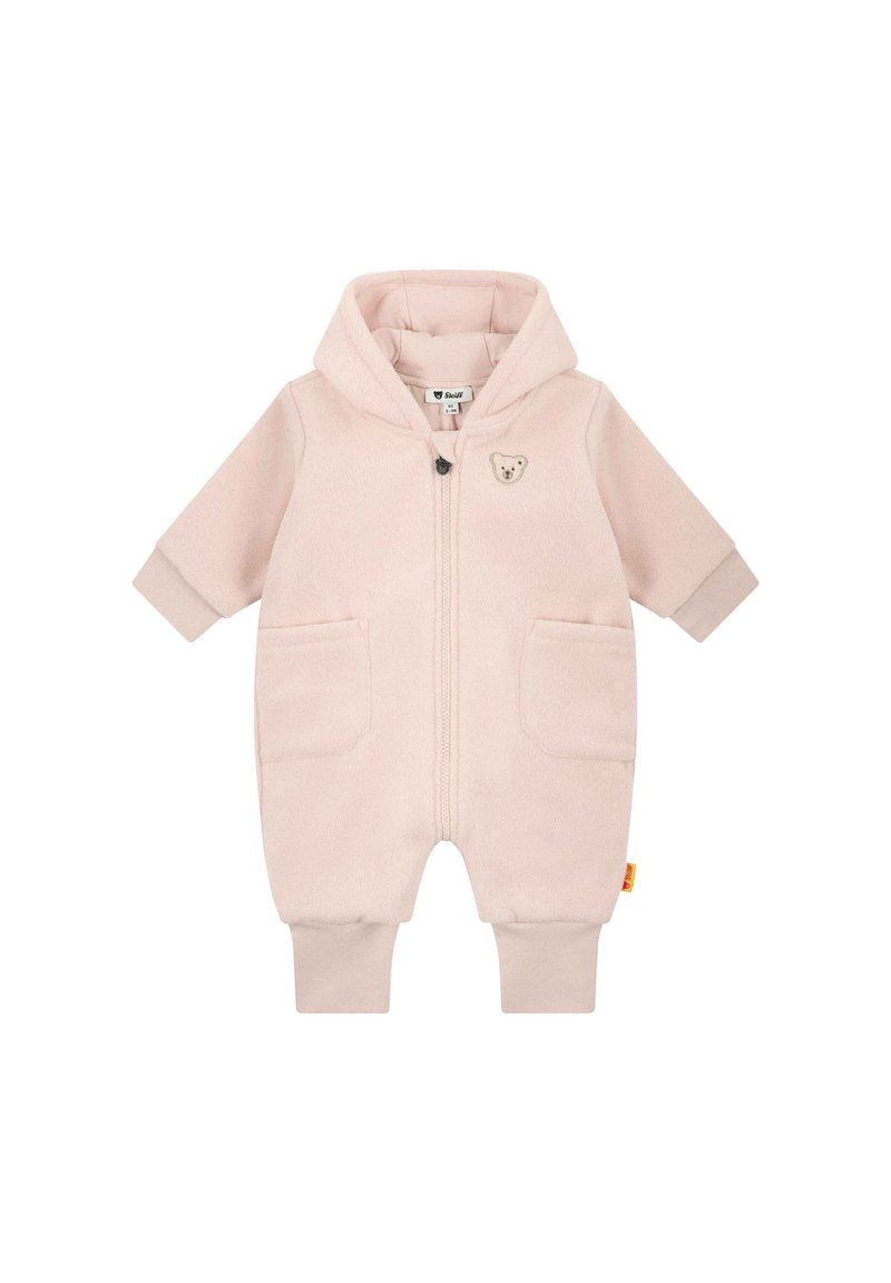 Combinaison en polaire rose pour bébé avec capuche, deux poches avant et un écusson en forme d'ours sur la poitrine. Comprend des poignets côtelés et une fermeture éclair.