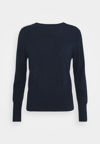 Pull bleu marine à manches longues et col rond. Motif texturé sur la partie supérieure. Tissu lisse, silhouette ajustée.
