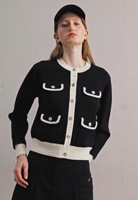 sandro MURCIE - Cardigan - noir