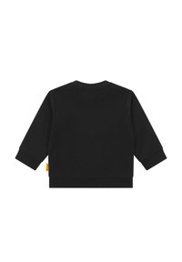 Felpa nera con maniche lunghe a raglan, polsini a coste e scollatura rotonda. Presenta un tessuto testurizzato e un piccolo etichetta gialla all'orlo.