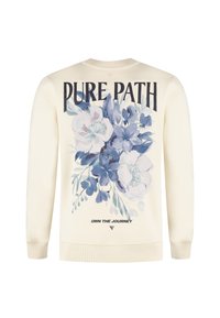 Crème sweatshirt met grote blauw-witte bloemenprint, "PURE PATH" tekst erboven en "OWN THE JOURNEY" tekst eronder op de achterkant.