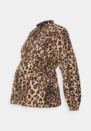 Leopard print maternity blouse with a collared neck, long sleeves, and a tie waist detail. Made from soft, textured fabric in shades of brown.