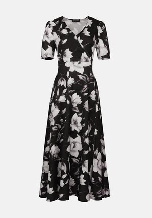 Kvetinové čierne šaty s krátkymi rukávmi, výstrihom do V a A-línie. Majú biely a šedý kvetinový vzor na čiernom pozadí.