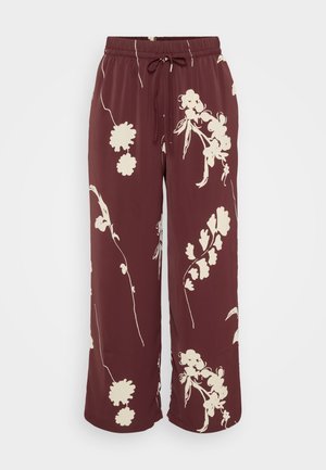 Bordo spalvoti plačiakelniai kelnių pagaminti iš lygaus audinio su baltais gėlių raštais, su elastingu liemeniu ir raišteliu reguliuojamam prigludimui.