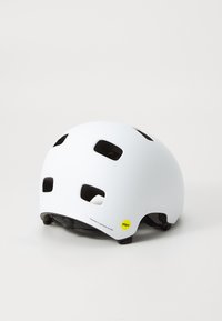 Casco da bicicletta bianco con una finitura opaca liscia. Presenta numerosi fori di ventilazione e una fodera interna nera. Include un adesivo giallo Mips.