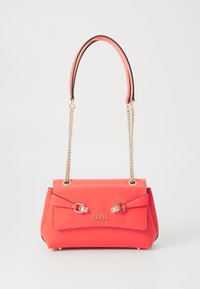 Red synthetic handbag with a structured design, chain and leather handles, decorative buckles, and embossed logo on the front.