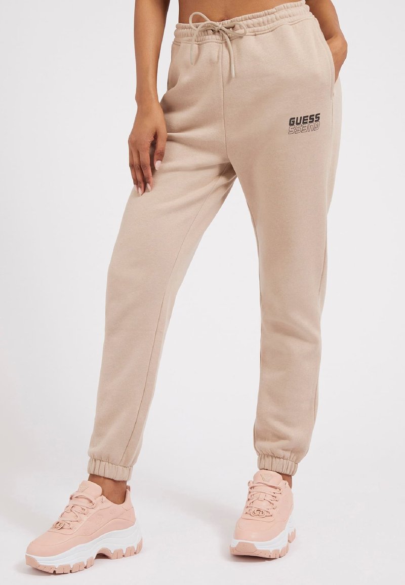 Guess ALISHA LONG Tracksuit bottoms beige Zalando