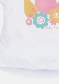White cotton baby shirt featuring colorful floral and bird designs in pink, blue, yellow, and green, with the text "Baby Friend."