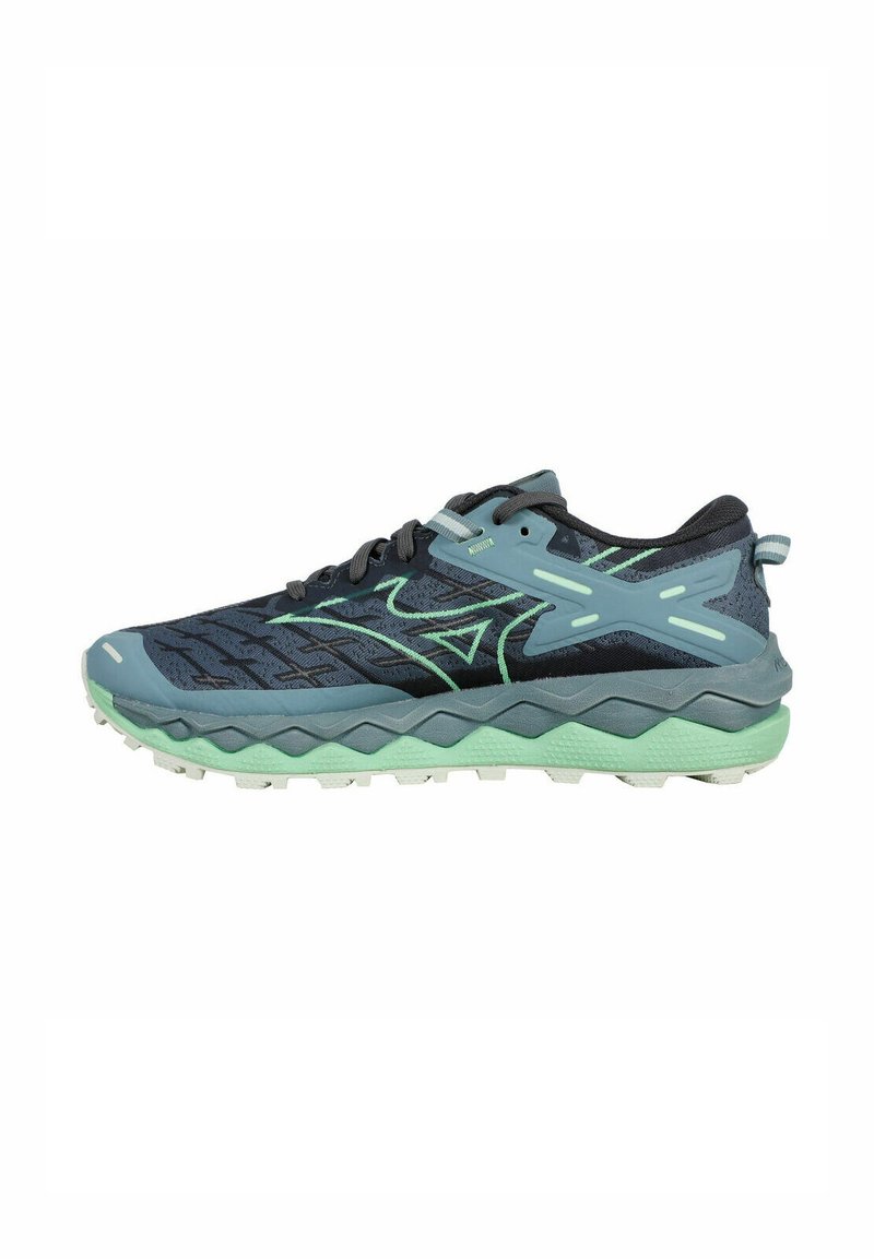 Scarpe da corsa da uomo con una combinazione di colori blu navy e verde menta, tomaia in mesh testurizzato, design della suola a zigzag e accenti sintetici.