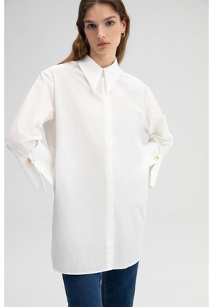 Touché Privé  WIDEE mleczny