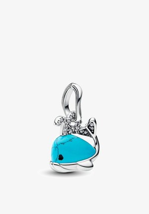 Turquoise charm shaped like a fish, featuring silver accents and clear stones. Smooth texture with natural veining on the stone.