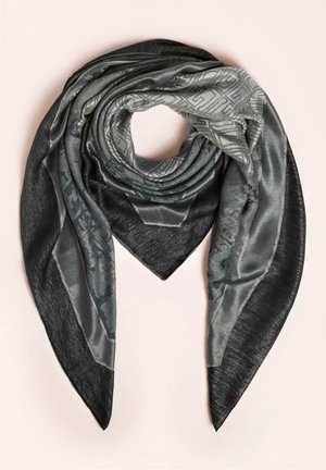 Écharpe triangulaire à motifs gris foncé et argenté, pliée avec les extrémités pointues pendantes, présentée sur un fond clair.