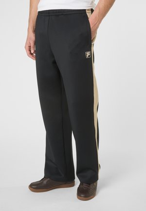 Fila APPAREL VAIANO RELAXED TAPED - Pantalones deportivos - black
