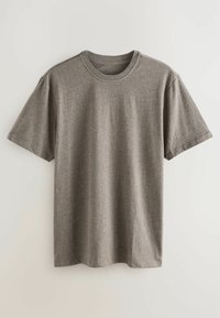 Graues T-Shirt mit kurzen Ärmeln, aus weichem, strukturiertem Stoff. Verfügt über einen Rundhalsausschnitt und eine lockere Passform, hängt vor einem neutralen Hintergrund.