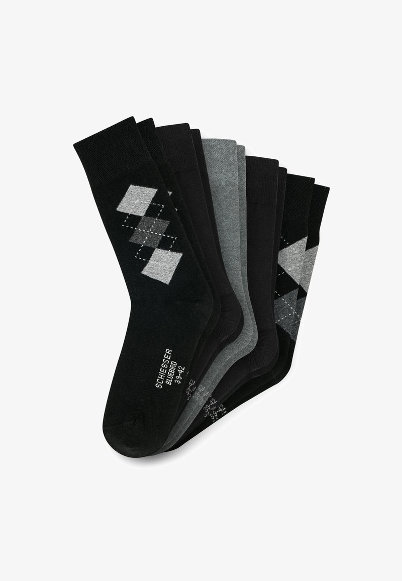Sept paires de chaussettes en noir et gris, avec des couleurs unies et un motif argyle en noir, blanc et gris sur une paire.