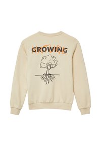 Felpa beige con grafica di un albero che mostra le radici, e la parola "GROWING" in grassetto nero attraversata da testo arancione scritto a mano.