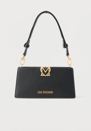 Black textured leather Love Moschino handbag with gold heart-shaped clasp and adjustable shoulder strap against a white background.