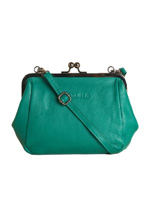 Teal leather crossbody bag with adjustable strap, metal kiss-lock clasp, and subtle embossed brand name on front.