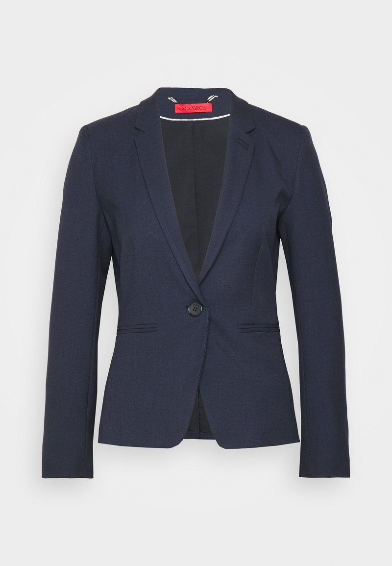 Blazer bleu marine cintré avec revers à encoches, fermeture par un seul bouton et deux poches avant. Confectionné en tissu texturé, intérieur non doublé.