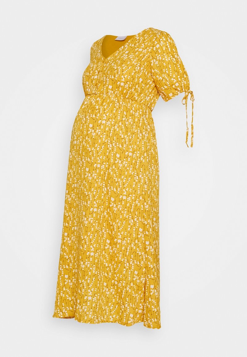 Robe de maternité jaune à fleurs avec manches courtes bouffantes et col en V, dotée d'une taille empire et de liens ajustables aux manches.