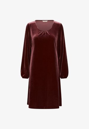 Long-sleeve velvet dress in deep burgundy with gathered neckline detail and elastic cuffs, knee-length and loose fitting.