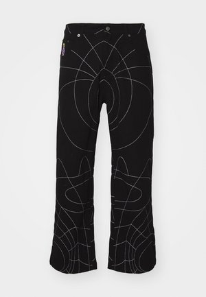 Pantalons noirs avec des coutures abstraites blanches. Comprend des poches standard, une fermeture à bouton et une coupe droite. Tissu texturé.