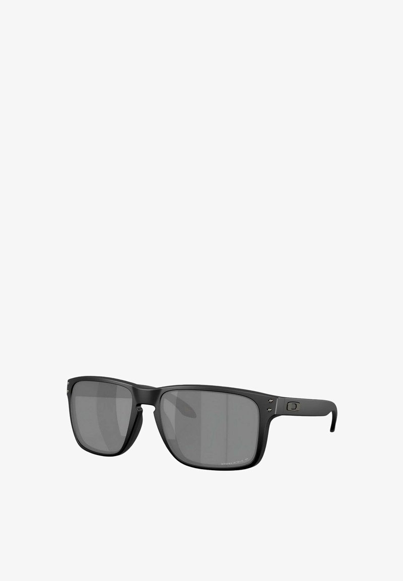 Black rectangular sunglasses with dark tinted lenses, sturdy matte plastic frame, and metal accents on the hinges.