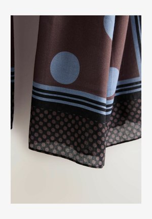 Bruine stof met grote blauwe cirkels en gestreepte patronen. Zoom heeft een doorzichtige sectie met zwarte stippen. Zachte textuur.