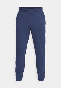 Königsblaue Jogginghose mit elastischem Bund und Bündchen, aus weichem Stoff gefertigt. Mit einem kleinen Logodetail an der Seite.
