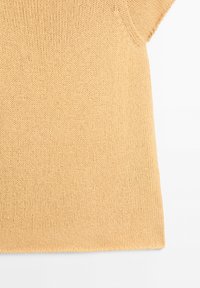 Beige knitted short-sleeve sweater with a simple, tight stitch pattern and a straight hem on a white background.