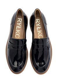 Black patent leather loafers with a rounded toe, accent stitching, and a textured brown rubber sole. Inside features gold branding.